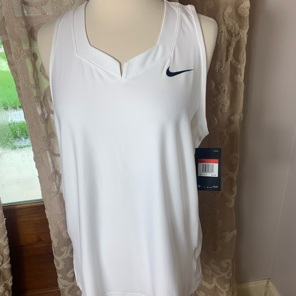 NWT. Nike Dri-Fit women’s tank size L